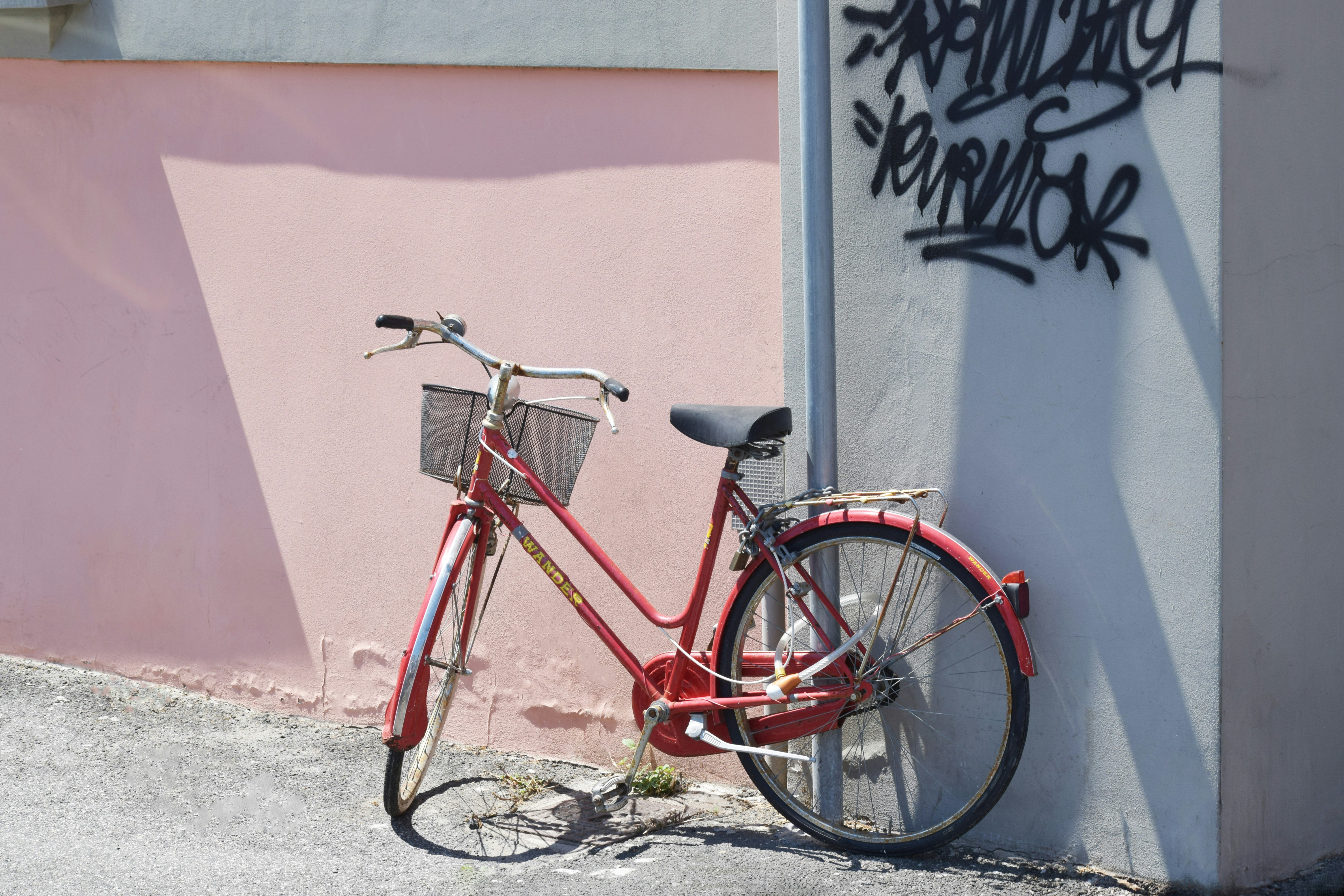 red commuter bike on road